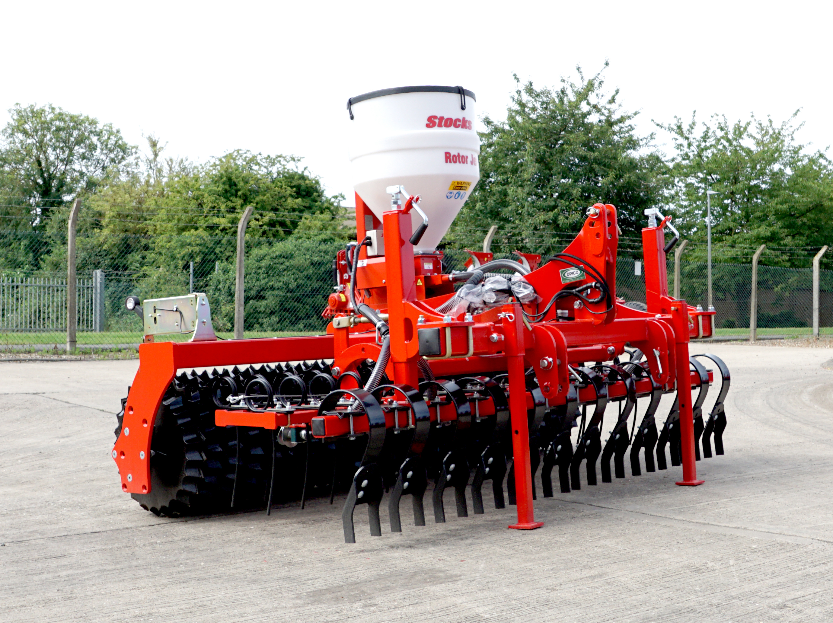 HE-VA Compact Grass Rejuvenator fitted with Stocks Ag Rotor Jet applicator, in yard